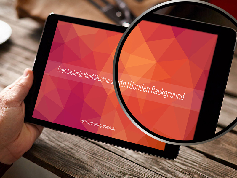 c2dba0bafbd70220ae0f31cff80eacab - Free Tablet In Hand Mockup With Wooden Background